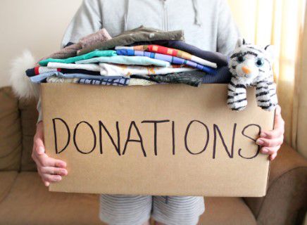 Box of clothes donations for charity