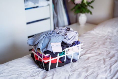 Basket of clothes ready for the clothes bank
